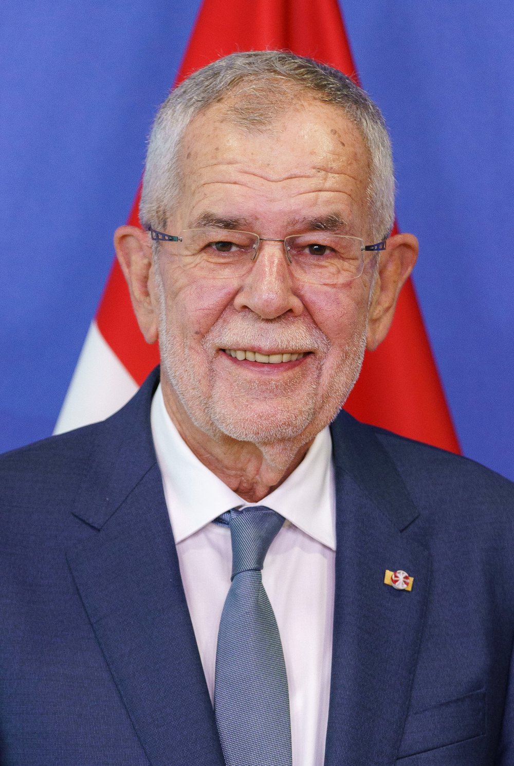 Van der Bellen triumphs over Hofer in presidential re-run, marking a political victory against far-right.