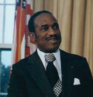Grenada gains full independence, Eric Gairy becomes Prime Minister, economy reliant on nutmeg exports.