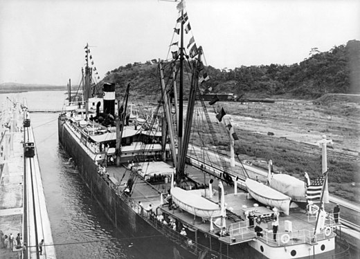 Panama Canal opens, linking Atlantic and Pacific Oceans, transforming global trade and transportation.