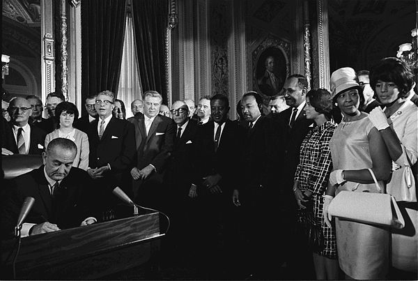 President Lyndon B. Johnson signed the Voting Rights Act into law, protecting citizens' voting rights.