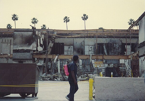 Violent protests in response to police officers' acquittal after beating Rodney King, in Los Angeles.