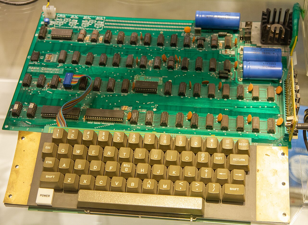 Apple Inc. established by Jobs, Wozniak, and Wayne in a garage, revolutionizing technology products.