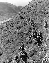 Troops joining UN forces in the Korean War, representing Canada's involvement in the conflict.