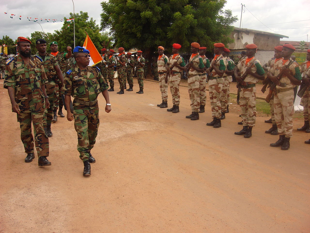 Mutiny spirals into rebellion with rebel takeover in Ivory Coast.