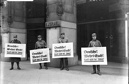 Nazi-led attacks against Jews during Kristallnacht in Germany.