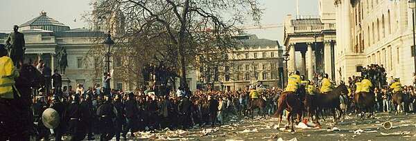 Violent protests in London against controversial Poll Tax, leading to widespread chaos and unrest.
