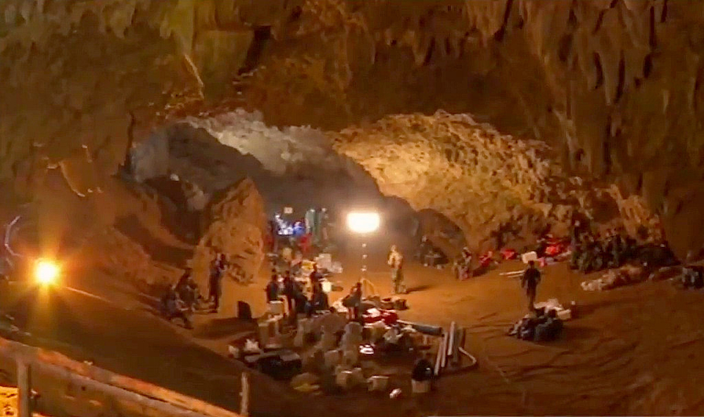 Stranded Boys and Coach in Flooded Cave