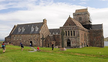 Saint Adomnán establishes Abbey of Iona, preserving Christian heritage with strict monastic rule.