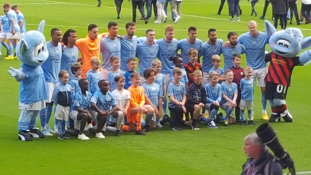 Manchester City clinch title in close race ahead of Liverpool on last day.