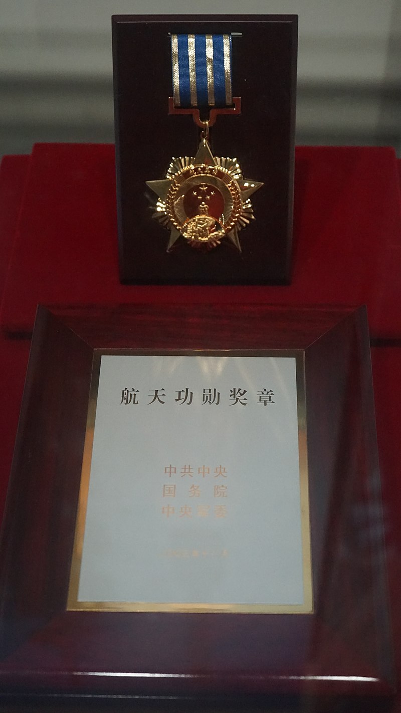 First Manned Spaceflight: Yang Liwei launched into space by Long March rocket.