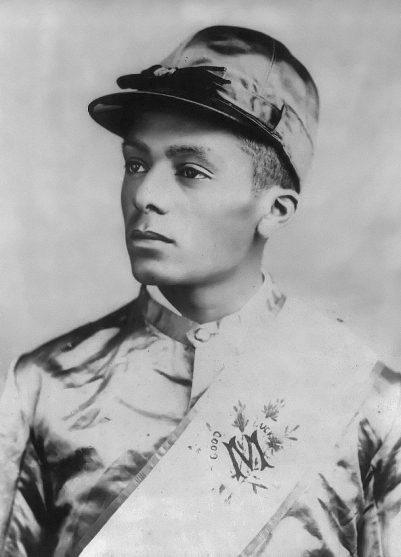 Historic horse race victory by Riley with jockey Isaac Murphy in muddy track conditions.