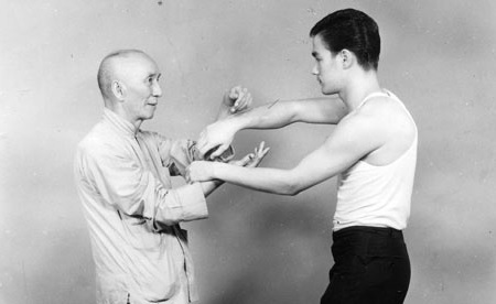 Bruce Lee begins training under Ip Man