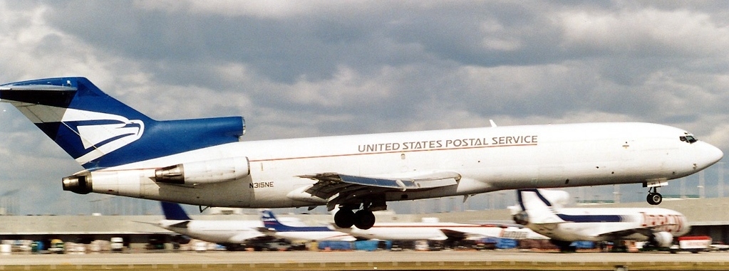 Moment image for USPS Boeing 727-200 at Miami Airport