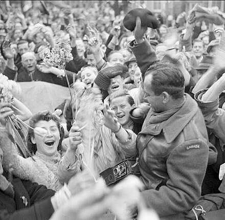 Moment image for Canadian forces' role in liberating the Netherlands from German occupation during World War II.