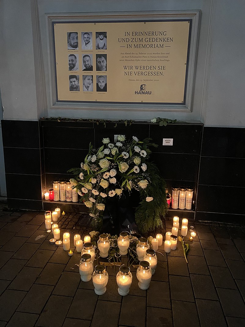 Moment image for Deadly shootings in Hanau, mourning victims, motive unclear, connections to far-right extremism suspected.