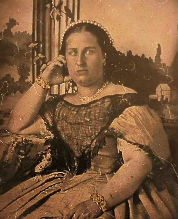 Moment image for Queen Maria II of Portugal dies, King Pedro V succeeds to the throne, marking a transition.