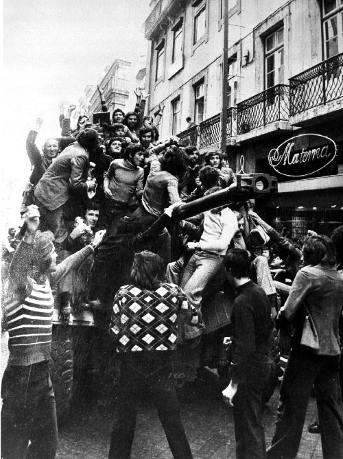 Moment image for Carnation Revolution ends dictatorship, grants independence to African colonies, transitions Portugal to democracy.