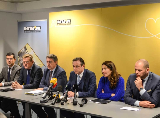 Moment image for Government collapses over migration pact dispute