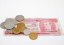 Moment image for Barbados shifts to Barbados dollar, boosts economic autonomy with Central Bank's strategic move.
