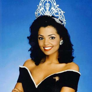 Moment image for Chelsi Smith: Miss Universe, American victory promoting diversity and inclusivity.