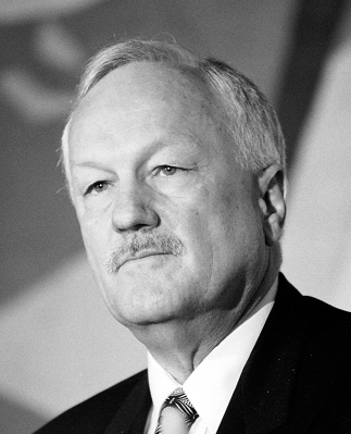 Moment image for Finance Minister Roger Douglas begins deregulating the economy.