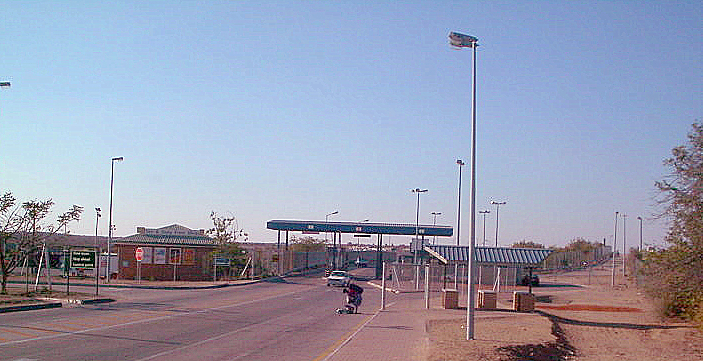 Moment image for Botswana starts building border fence with Zimbabwe.