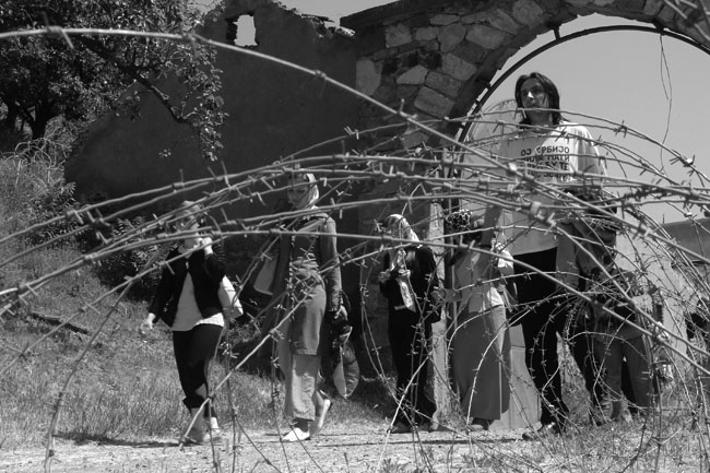 Moment image for Escalating Tensions in Kosovo: Ethnic violence leads to casualties, destruction, and strained relations.