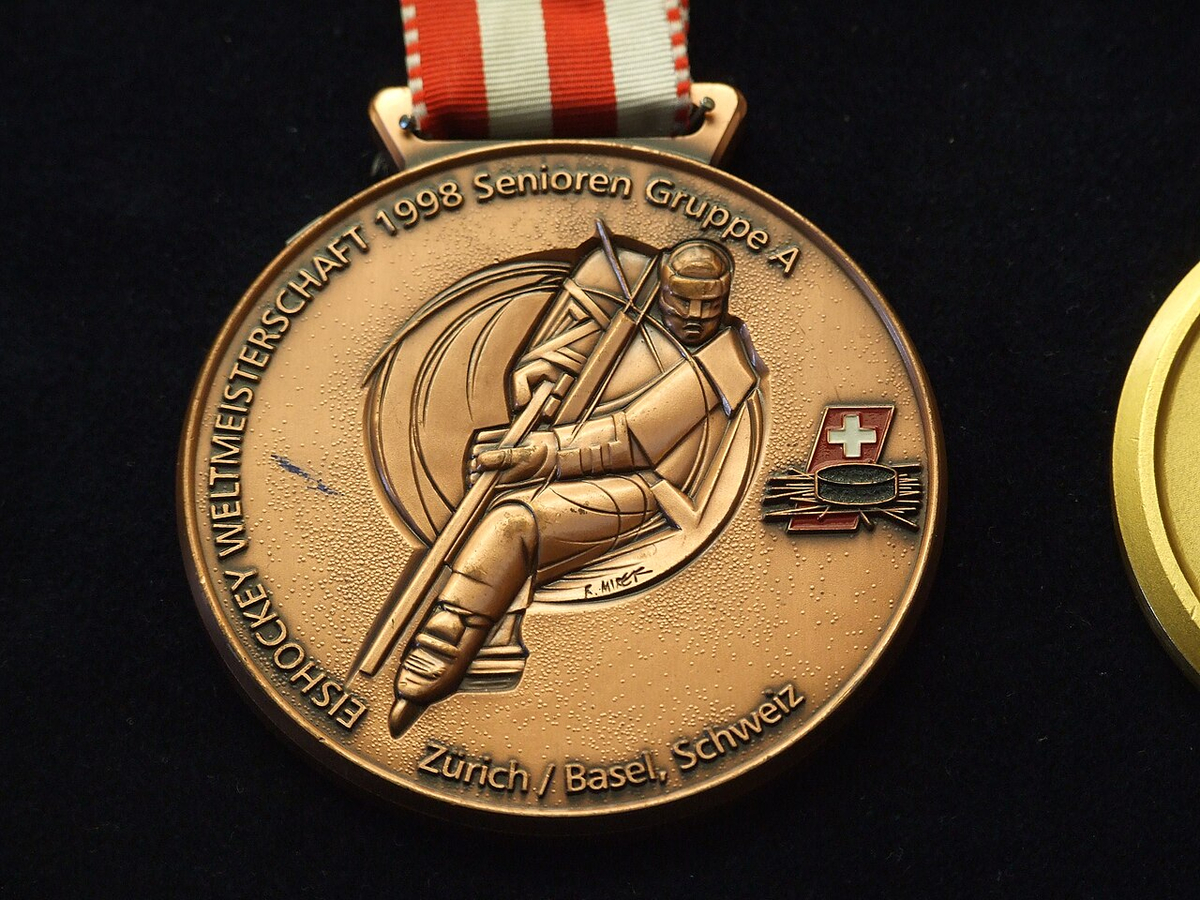 Moment image for Sweden wins gold, Finland silver, Czech Republic tied for bronze; new format for World Championships.