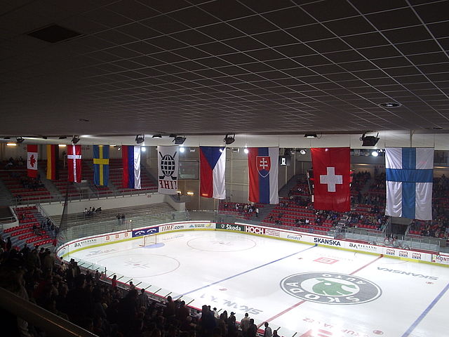 Moment image for Winners and host cities/countries of ice hockey championships summarized in few words.