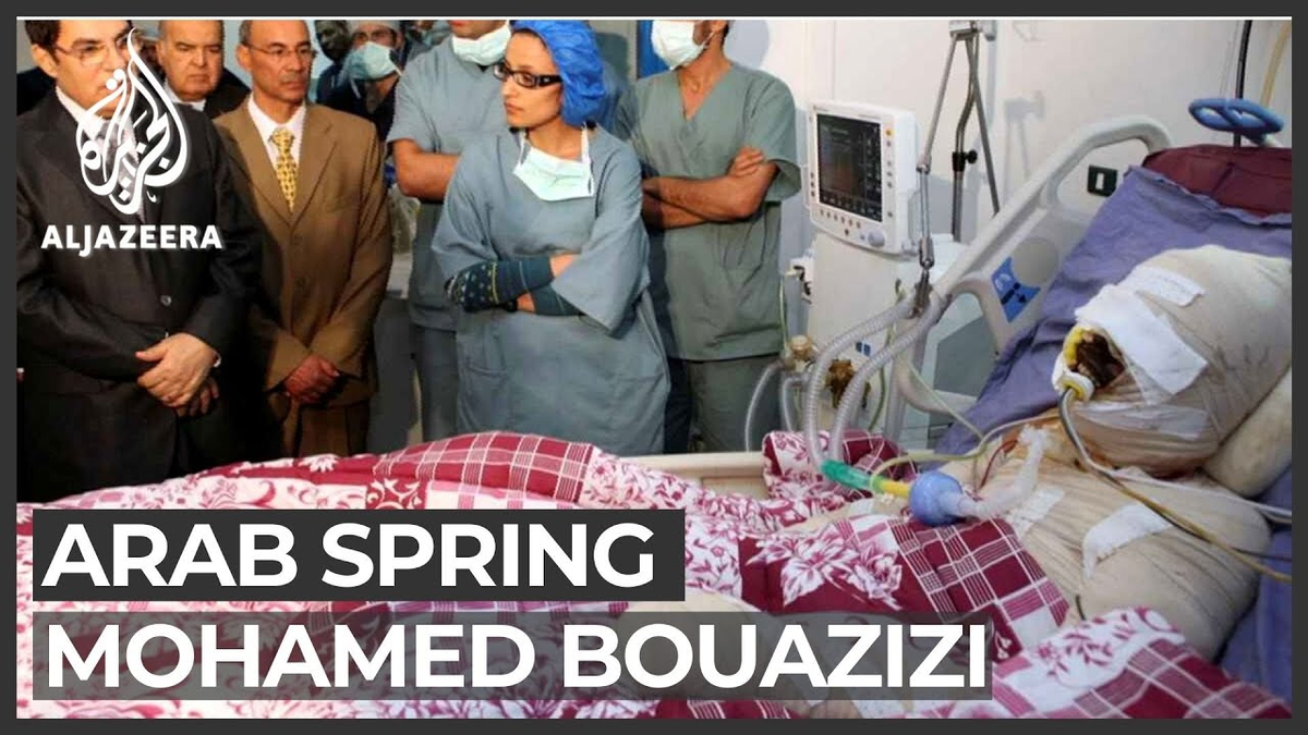 Moment image for Mohamed Bouazizi's self-immolation ignites nationwide protests against police harassment in Tunisia.