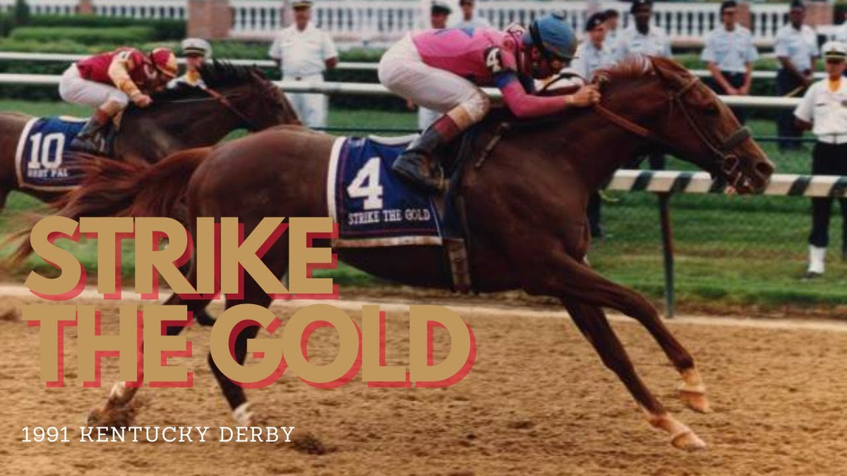 Moment image for Strike the Gold: Champion team in thrilling 1+1⁄4 mile race on fast track in 2:03.0.