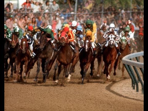 Moment image for Cannonade's victory with Ángel Cordero Jr. under Woody Stephens in record time on fast track.