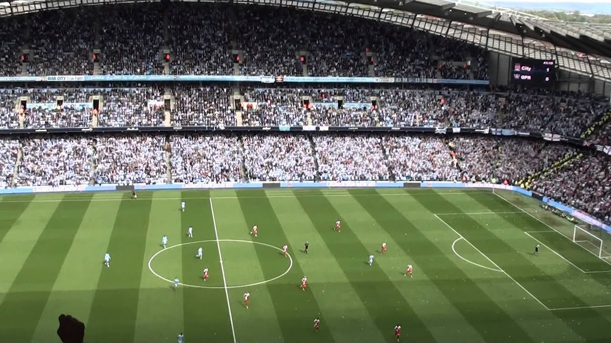 Moment image for Manchester City clinches title with Aguero's last-minute goal in dramatic fashion.