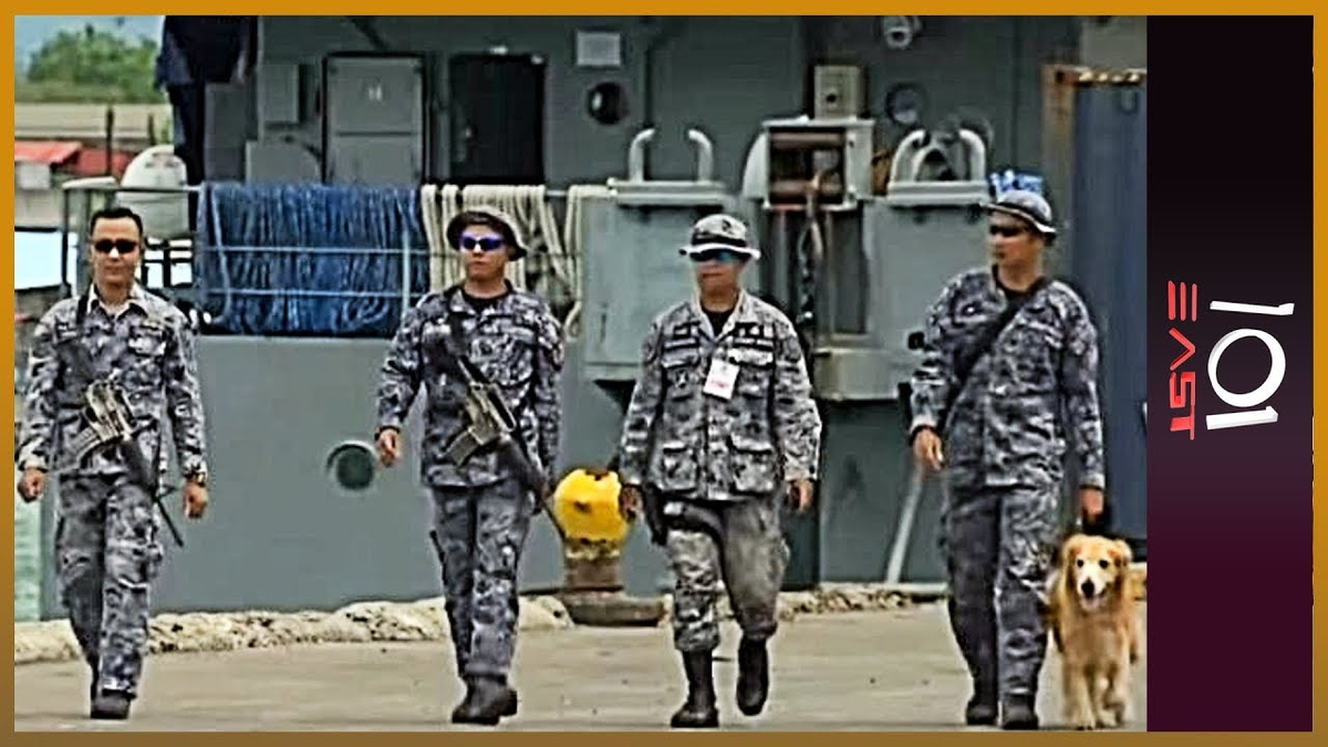 Moment image for Naval standoff at Scarborough Shoal reef in South China Sea.