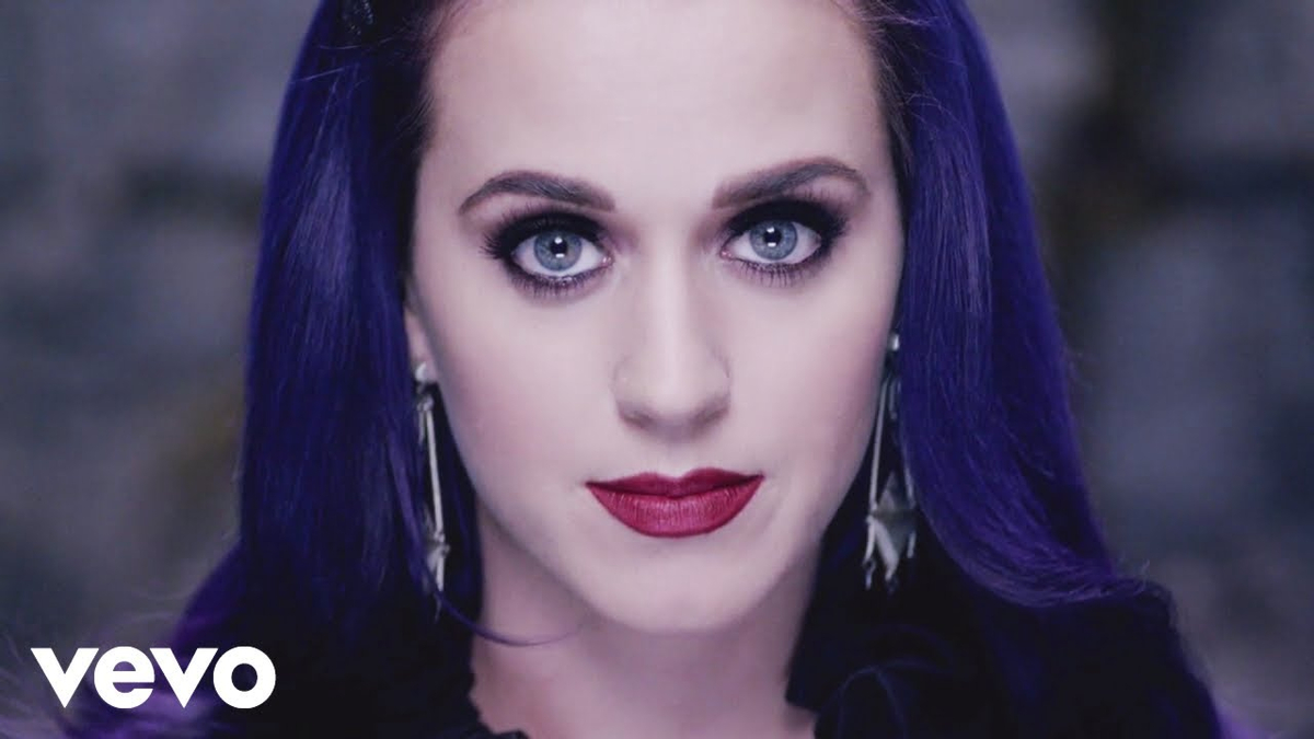Moment image for Wide Awake' music video showcases transformation, empowerment, and symbolism, resonating with viewers.