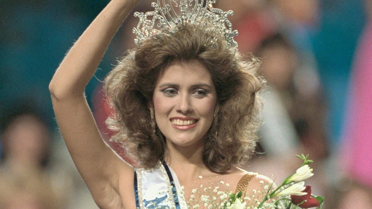 Moment image for Deborah Carthy-Deu: Puerto Rico's Second Miss Universe Winner and Cultural Icon.