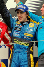 Fernando Alonso becomes F1's youngest world champion by defeating Kimi Räikkönen in Brazil.
